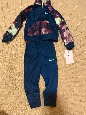 Nike Kids Navy Blue Joggers with Teal Swoosh